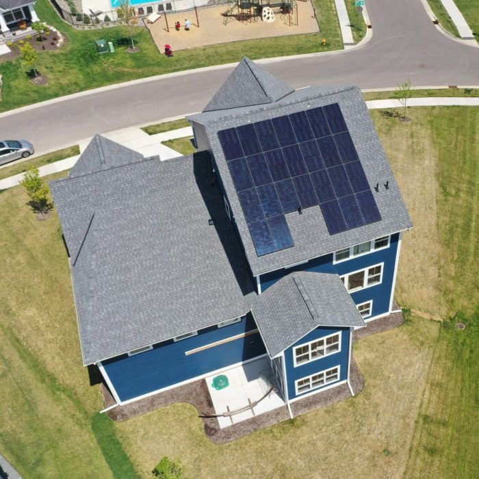 Aerial view of a residential rooftop solar installation - Home Solar Panel Installation