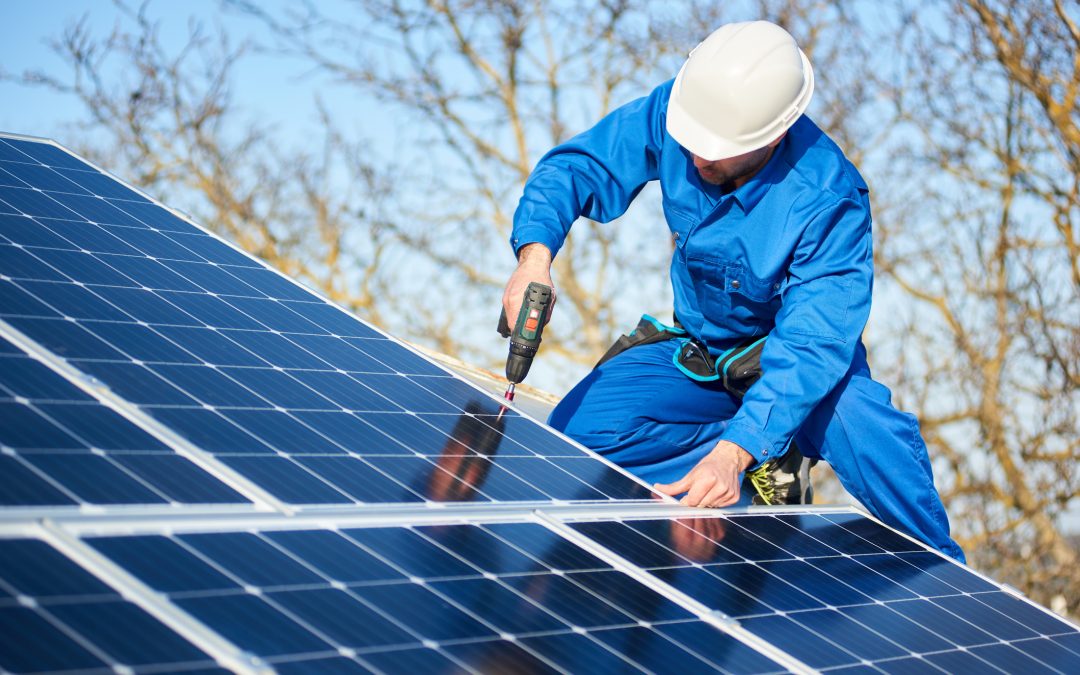 is your roof solar ready? technician installing solar panels on a roof