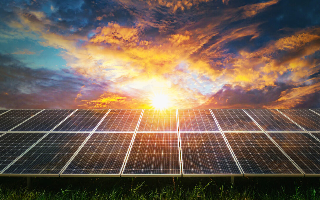 a solar panel with the sun shining through the clouds - Solar Energy