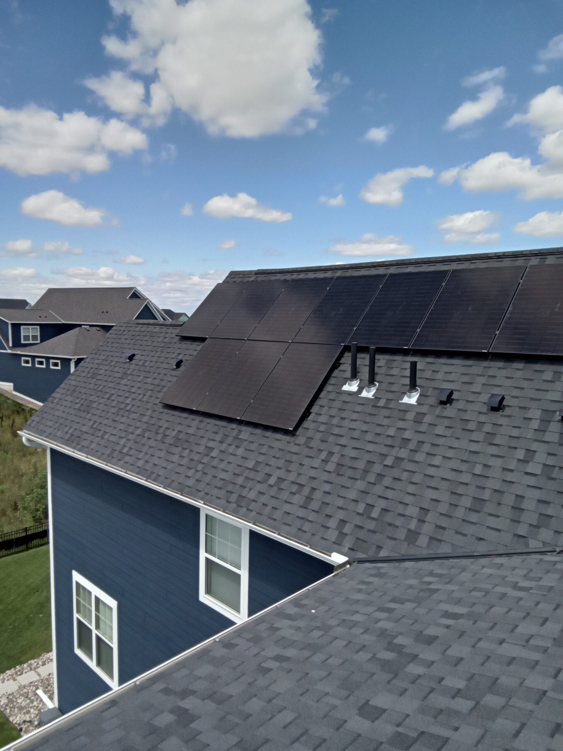 a house with a solar panel on the roof - Solar Energy in Minnesota 