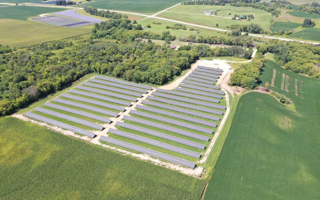 an aerial view of a large solar farm - Solar Energy for Farmers and Rural Businesses