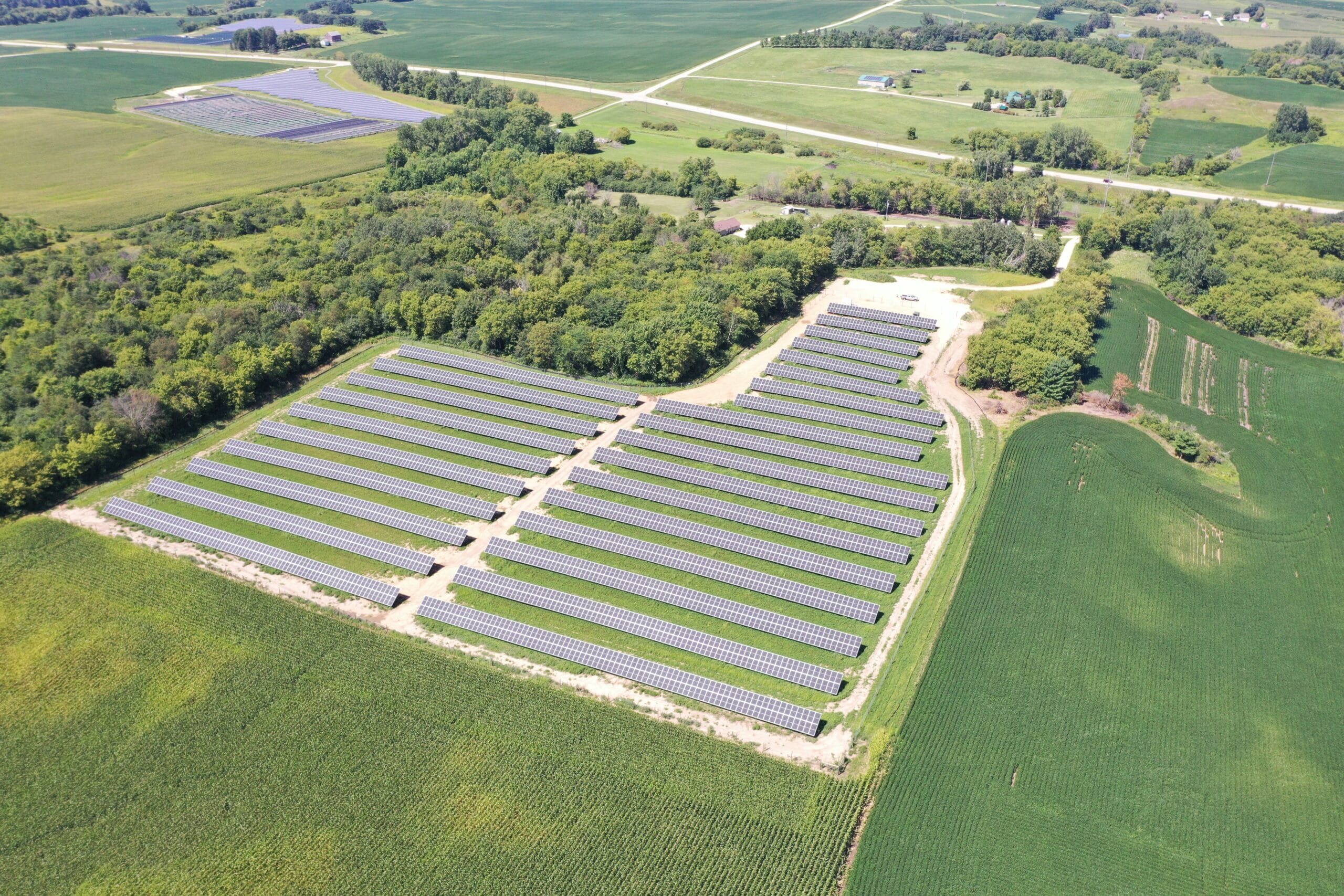 an aerial view of a large solar farm - Solar Energy for Farmers and Rural Businesses